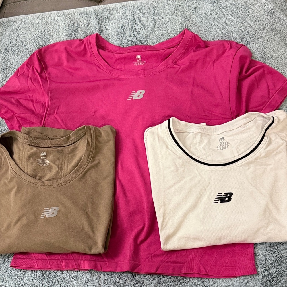 New Balance T-Shirts in Fuchsia, Beige, and Ivory
